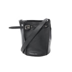 Minimalism with presence. The Céline Big Bag Bucket in black leather features a clean, sculptural shape with a belted detail and shoulder strap—an elevated everyday piece that feels quietly confident.
