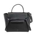 Front view of an authentic Celine Belt Bag Micro in black grained calfskin leather, featuring a top handle, front flap with signature belt detail, and detachable shoulder strap.
