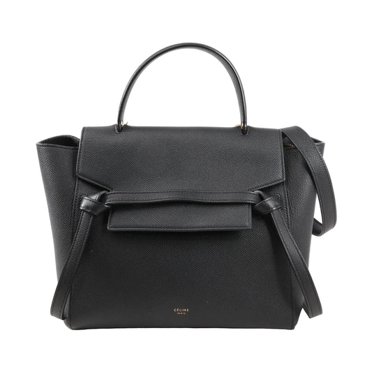 Front view of an authentic Celine Belt Bag Micro in black grained calfskin leather, featuring a top handle, front flap with signature belt detail, and detachable shoulder strap.
