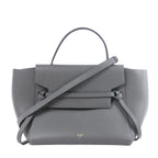 Celine Mini Belt Bag in grey leather with winged sides, belted front detail, top handle, shoulder strap and gold-tone hardware.