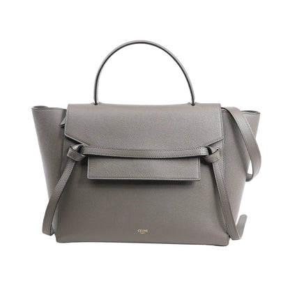Front view of a Celine Belt Bag Mini in gray grained leather featuring a structured silhouette, front flap with belt detail, top handle, and detachable shoulder strap.