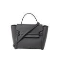 Celine Belt Bag Mini in gray grained leather with top handle, front flap and belt strap detail, and detachable shoulder strap on white background.