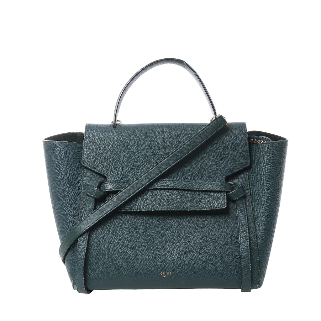 Front view of Celine Belt Bag Mini in green grained leather with top handle, long shoulder strap, flap closure with belt detail, and small gold “CELINE PARIS” logo.