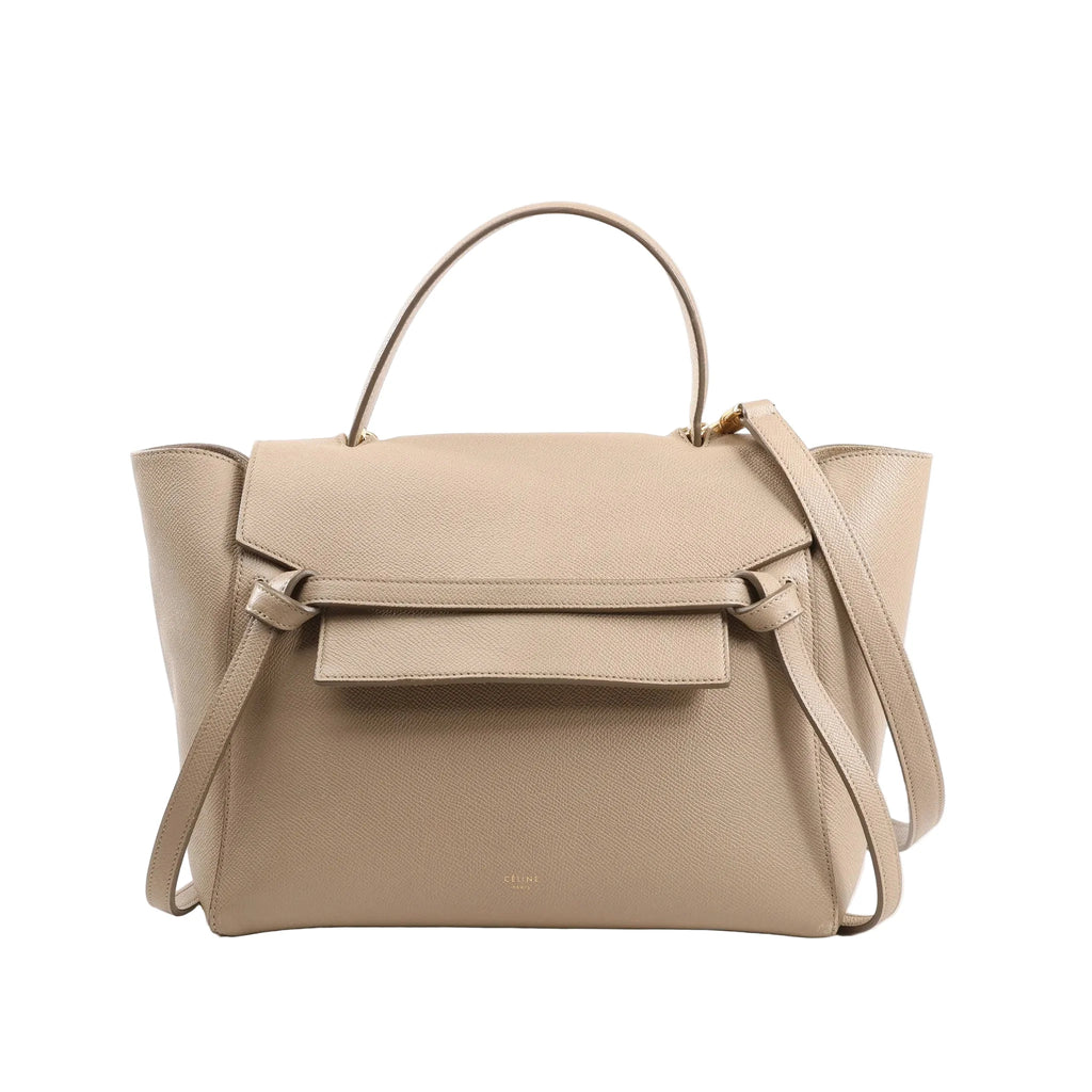 Celine Belt Bag Mini 2way handbag in beige grained leather with top handle, flap closure, knotted front belt detail, gold logo stamping, and detachable shoulder strap.