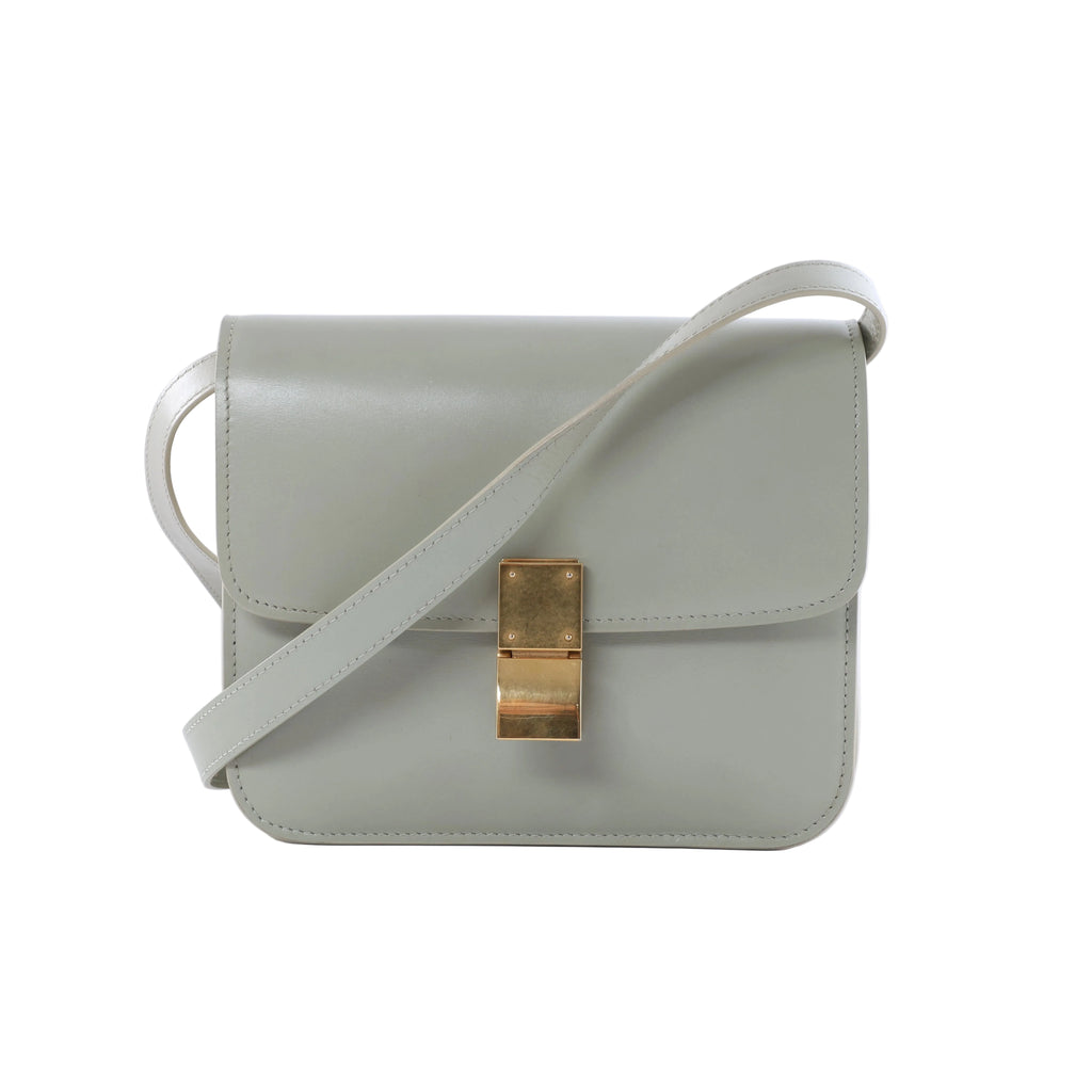 Celine Classic Box Small light green leather shoulder bag with structured flap, gold-tone rectangular clasp and slim matching strap.