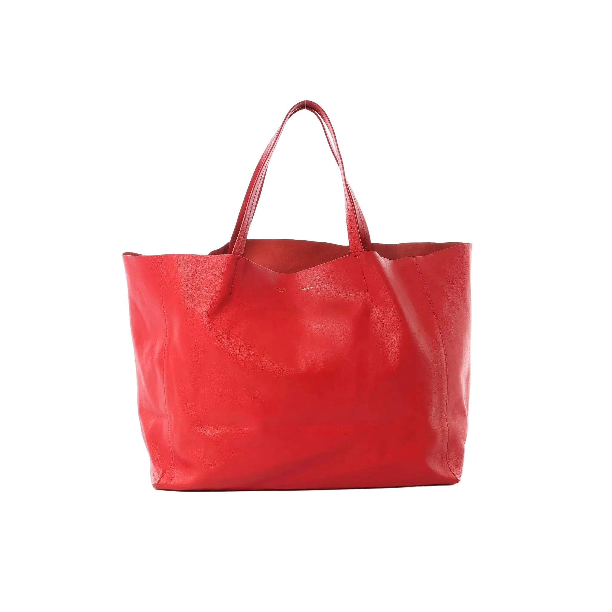 Red leather CELINE Cabas Horizontal tote bag with long shoulder straps and open top, photographed on a white background.