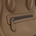 Bolso de mano Celine Luggage Micro Leather x Suede en negro y blanco