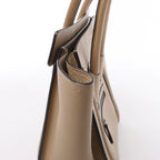 Bolso de mano Celine Luggage Micro Leather x Suede en negro y blanco