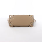 Bolso de mano Celine Luggage Micro Leather x Suede en negro y blanco