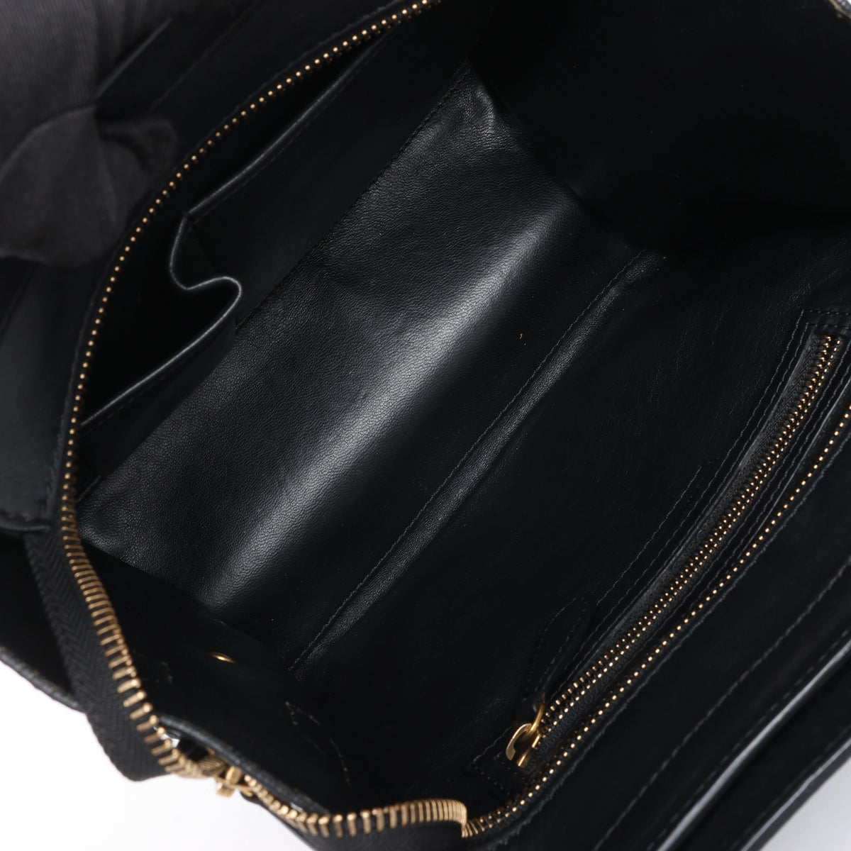 Bolso de mano Celine Luggage Micro Leather x Suede en negro y blanco