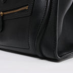 Bolso de mano Celine Luggage Micro Leather x Suede en negro y blanco