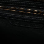 Bolso de mano Celine Luggage Micro Leather x Suede en negro y blanco