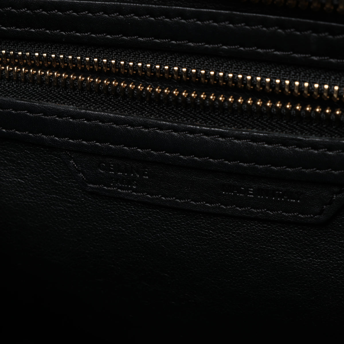 Bolso de mano Celine Luggage Micro Leather x Suede en negro y blanco