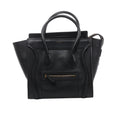Black Celine Luggage Micro Shopper leather handbag with double top handles, winged sides, curved front piping, front zip pocket and gold-tone logo.