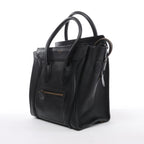 Bolso de mano Celine Luggage Micro Leather x Suede en negro y blanco