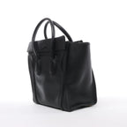 Bolso de mano Celine Luggage Micro Leather x Suede en negro y blanco