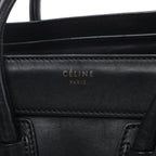 Bolso de mano Celine Luggage Micro Leather x Suede en negro y blanco
