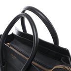 Bolso de mano Celine Luggage Micro Leather x Suede en negro y blanco