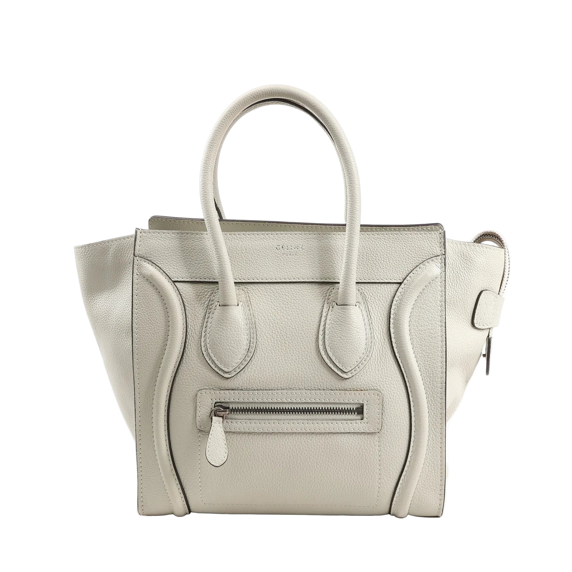 Celine Luggage Micro Handbag in ecru grained leather, featuring a structured design with top handles, front zip pocket, curved stitched detailing, and side gussets, displayed against a white background.