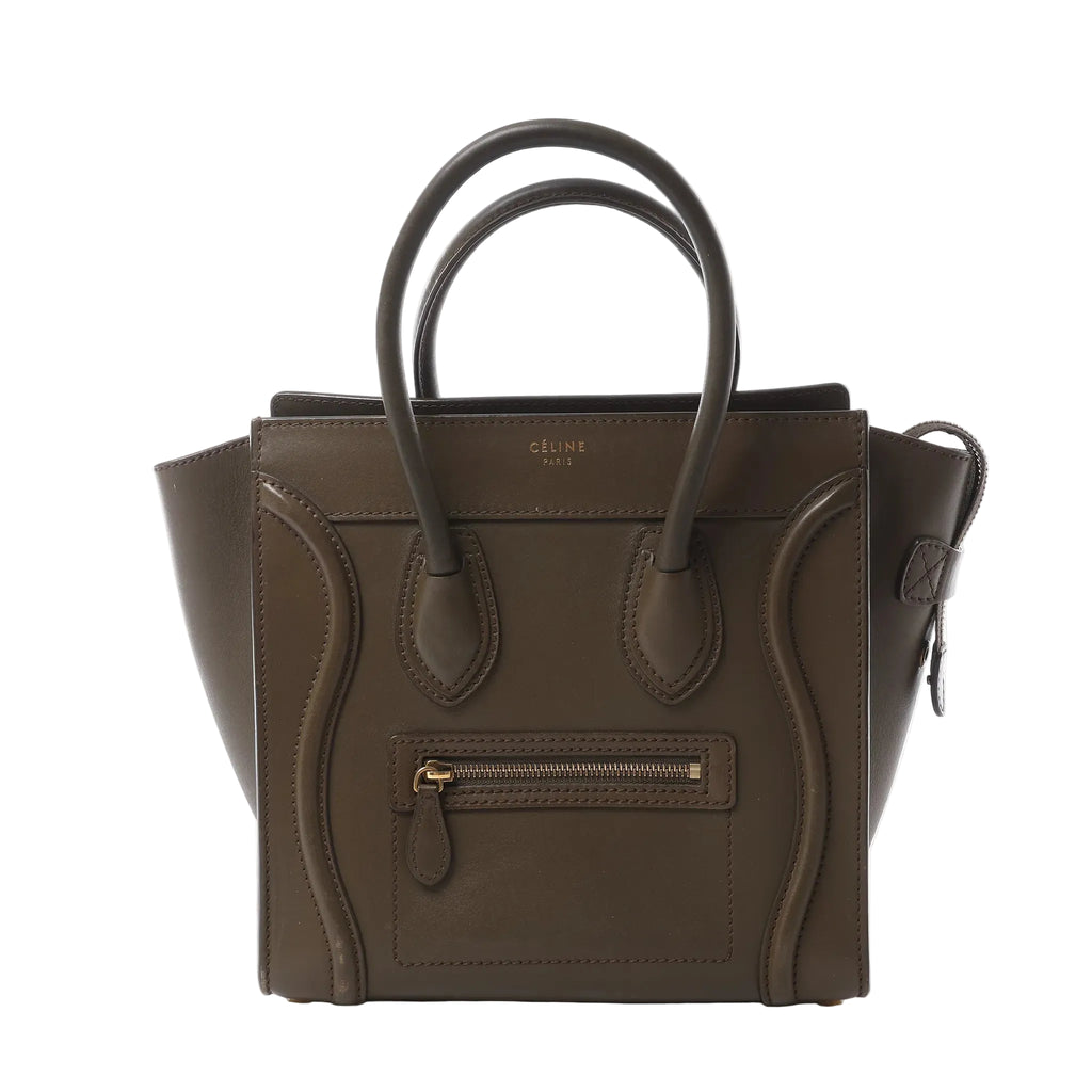 Celine Luggage Micro handbag in khaki smooth leather with rolled top handles, signature front zip pocket, winged side panels and gold-tone hardware, displayed against a white background.