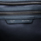Bolso de mano Celine Luggage Micro Leather x Suede en negro y blanco