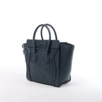 Bolso de mano Celine Luggage Micro Leather x Suede en negro y blanco