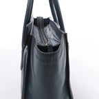 Bolso de mano Celine Luggage Micro Leather x Suede en negro y blanco
