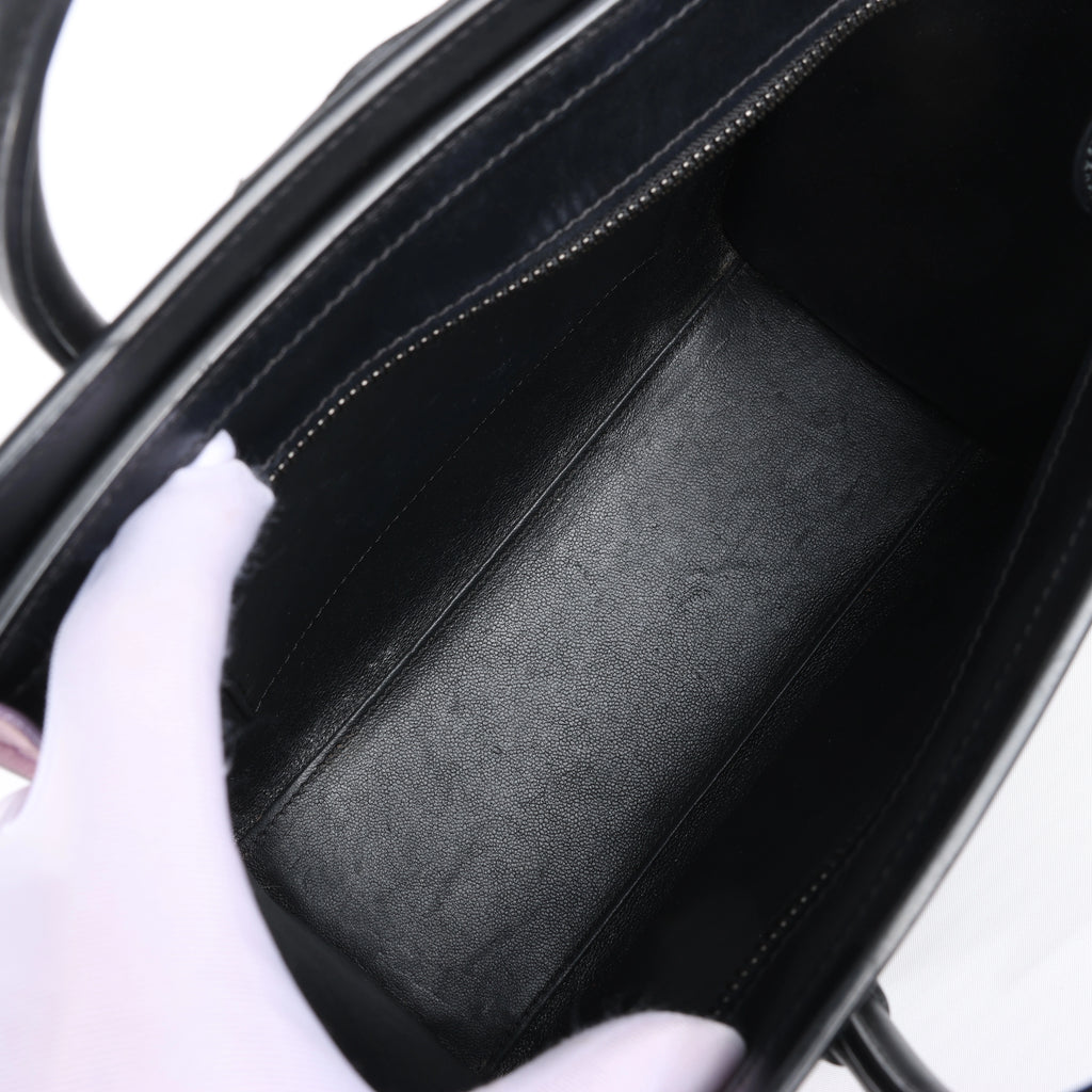 Bolso de mano Celine Luggage Micro Leather x Suede en negro y blanco