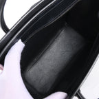 Bolso de mano Celine Luggage Micro Leather x Suede en negro y blanco