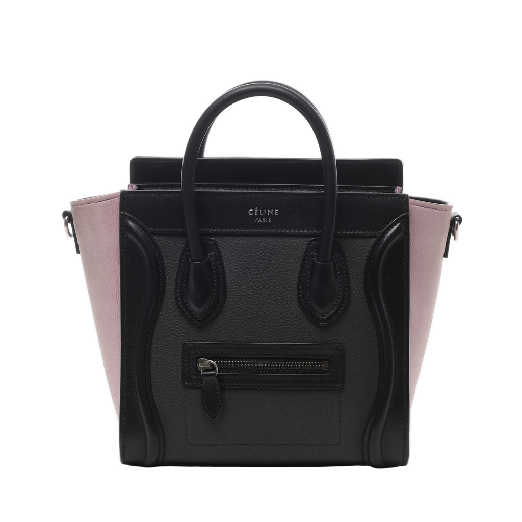 Black Celine Luggage Nano handbag with pale pink side panels, rounded top handles, silver-tone hardware and signature front zip pocket.