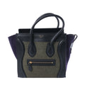 Celine Luggage Micro black leather and green felt handbag with purple side panels, double top handles, gold-tone logo and front zip pocket.