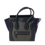 Celine Luggage Micro black leather and green felt handbag with purple side panels, double top handles, gold-tone logo and front zip pocket.