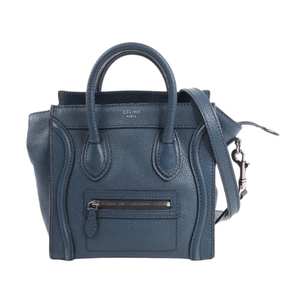 Blue handbag with a visible brand logo on a white background