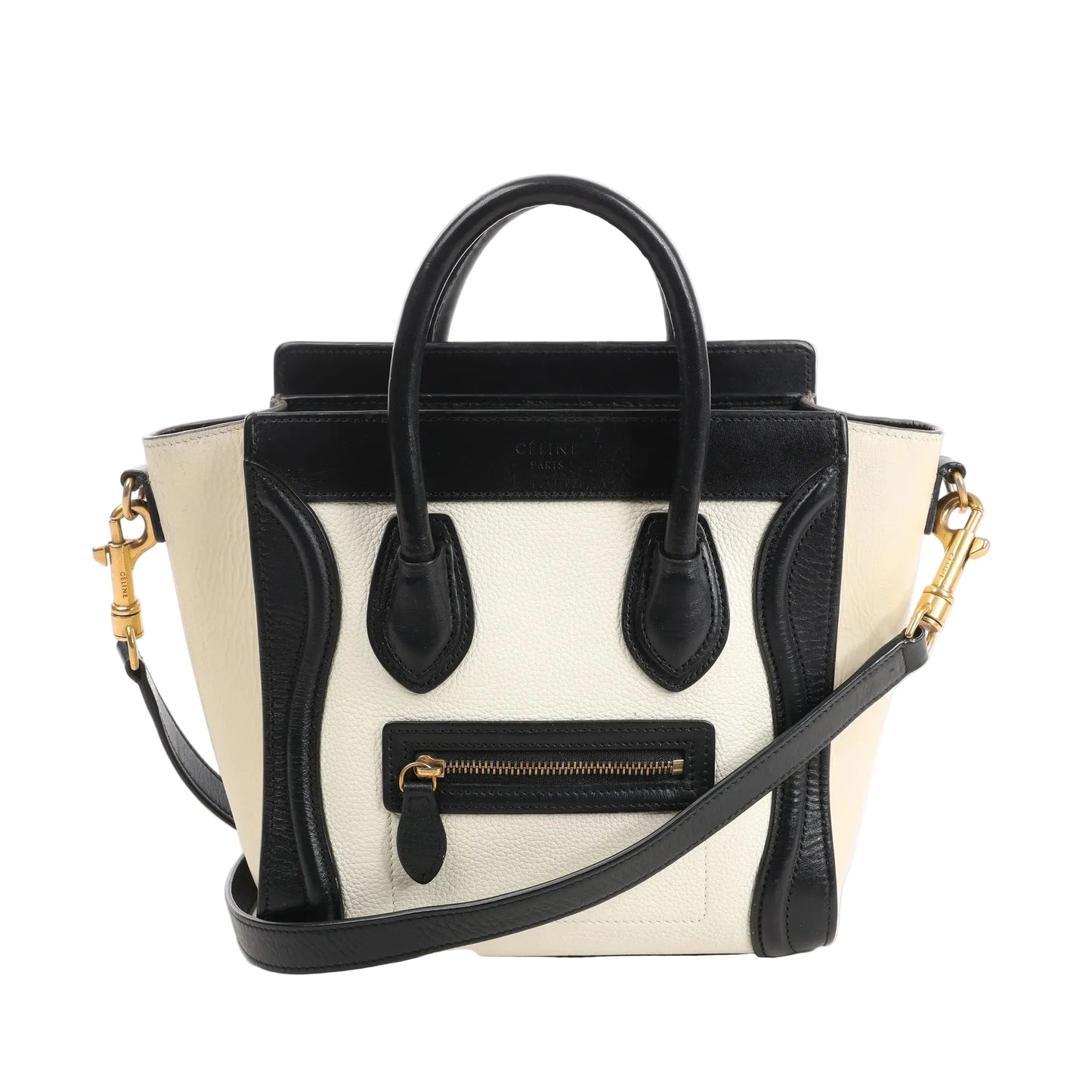 CELINE Nano Luggage 2Way handbag in black and white grained leather with top handles, front zip pocket, and detachable shoulder strap.