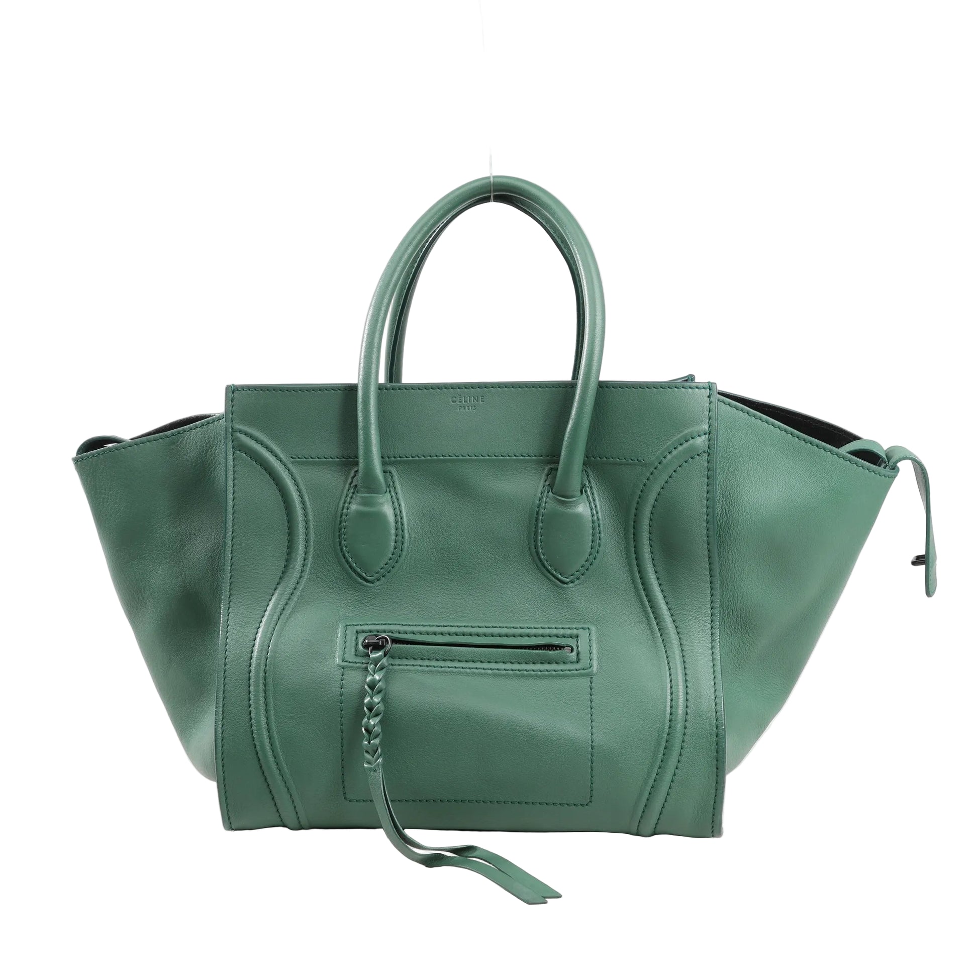 CELINE Luggage Phantom Small handbag in green leather with structured silhouette, braided front zipper pull, and dual top handles against a white background.