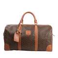 Celine Macadam Boston travel bag featuring brown monogram PVC, tan leather handles and trim, with a structured silhouette and gold-tone hardware.