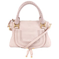Chloé Marcie pink leather handbag with wrapped top handles, curved front stitching, gold-tone hardware and detachable shoulder strap.