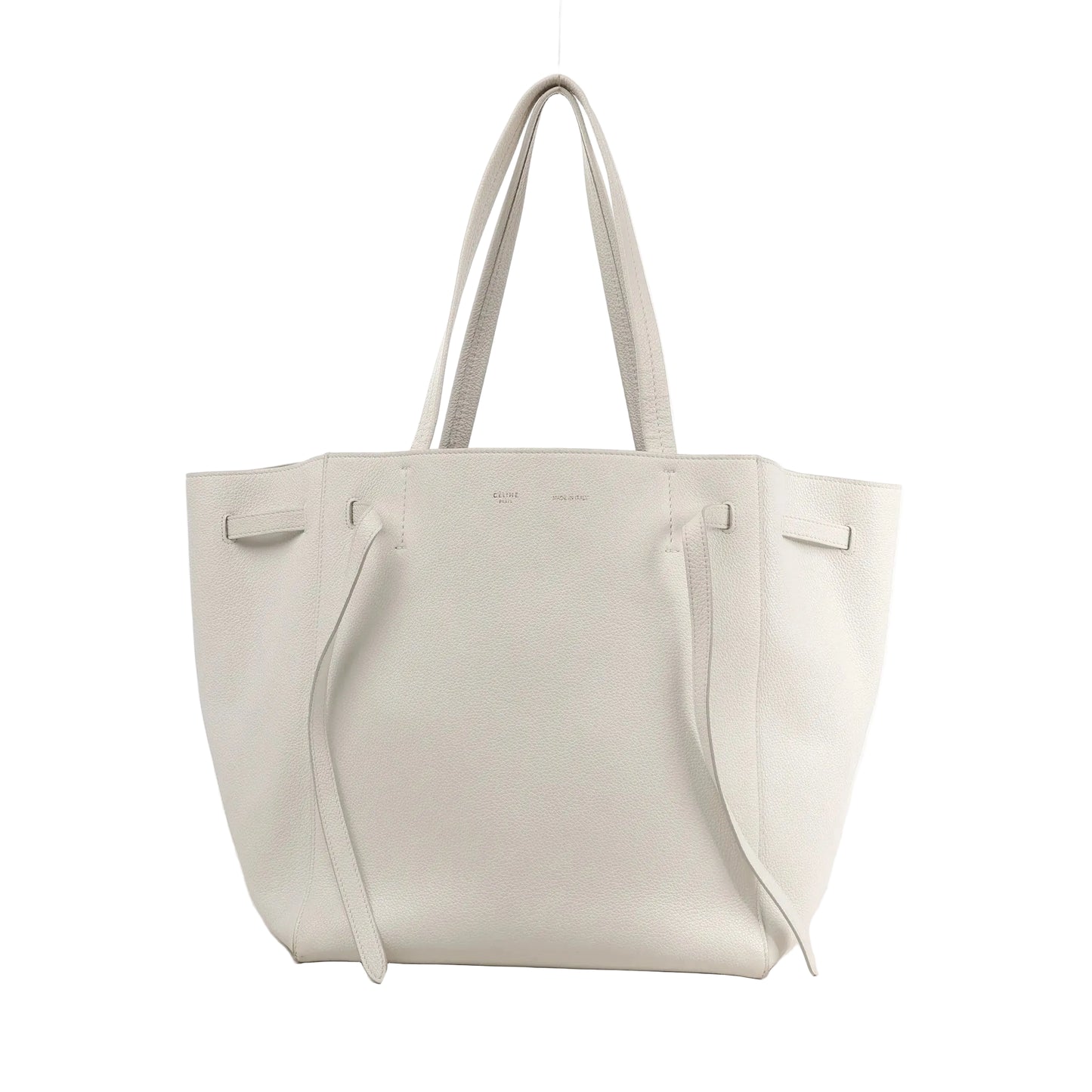 Celine Cabas Phantom Small Shoulder Bag in white grained leather with double handles, side tie details, and minimalist branding on the front.