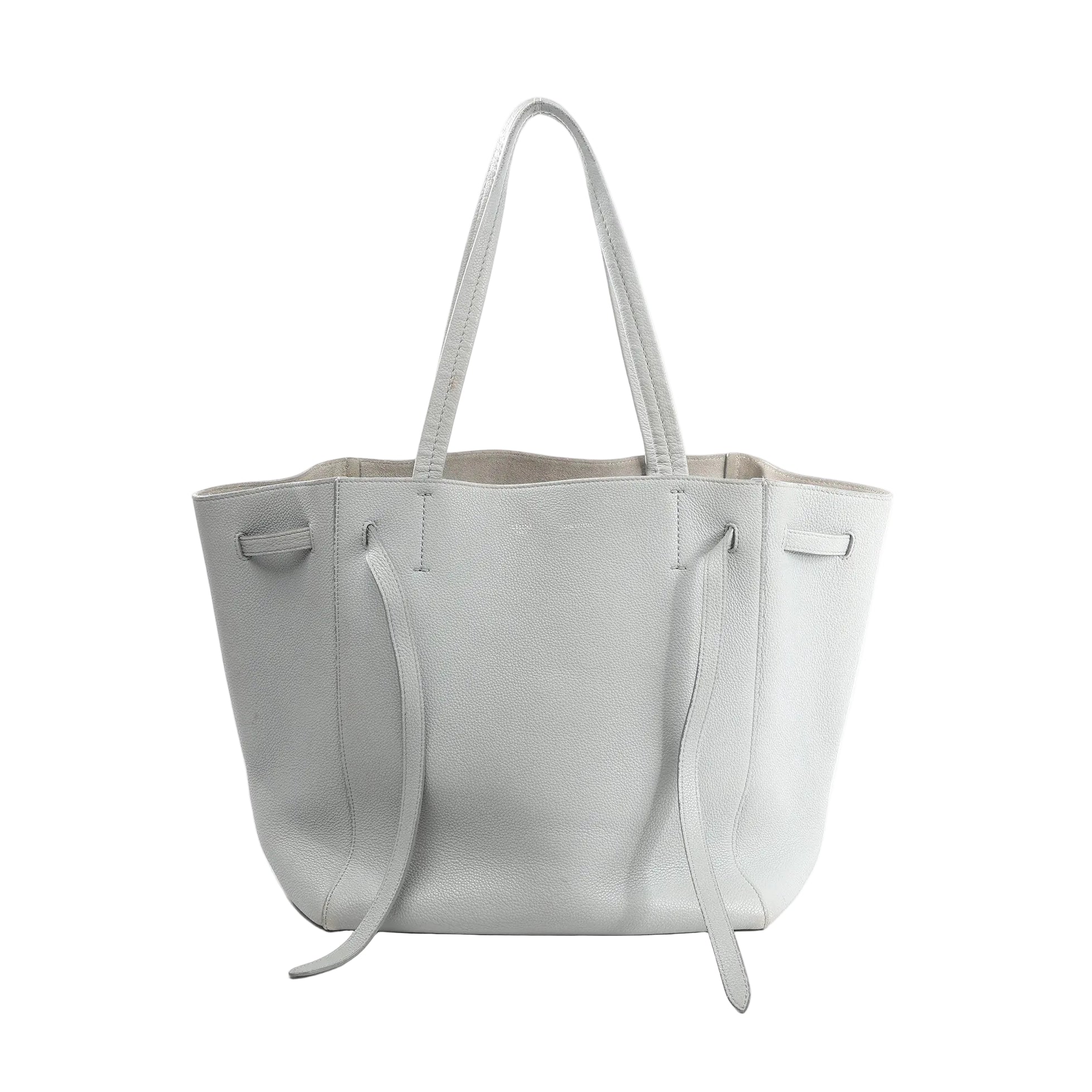 Celine Cabas Phantom Small tote in gray pebbled leather with long shoulder straps and side tie details, front view on white background.