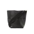 Black Celine Seau Sangle leather bucket shoulder bag with wide black web strap and small gold Celine Paris logo, shown on a white background.