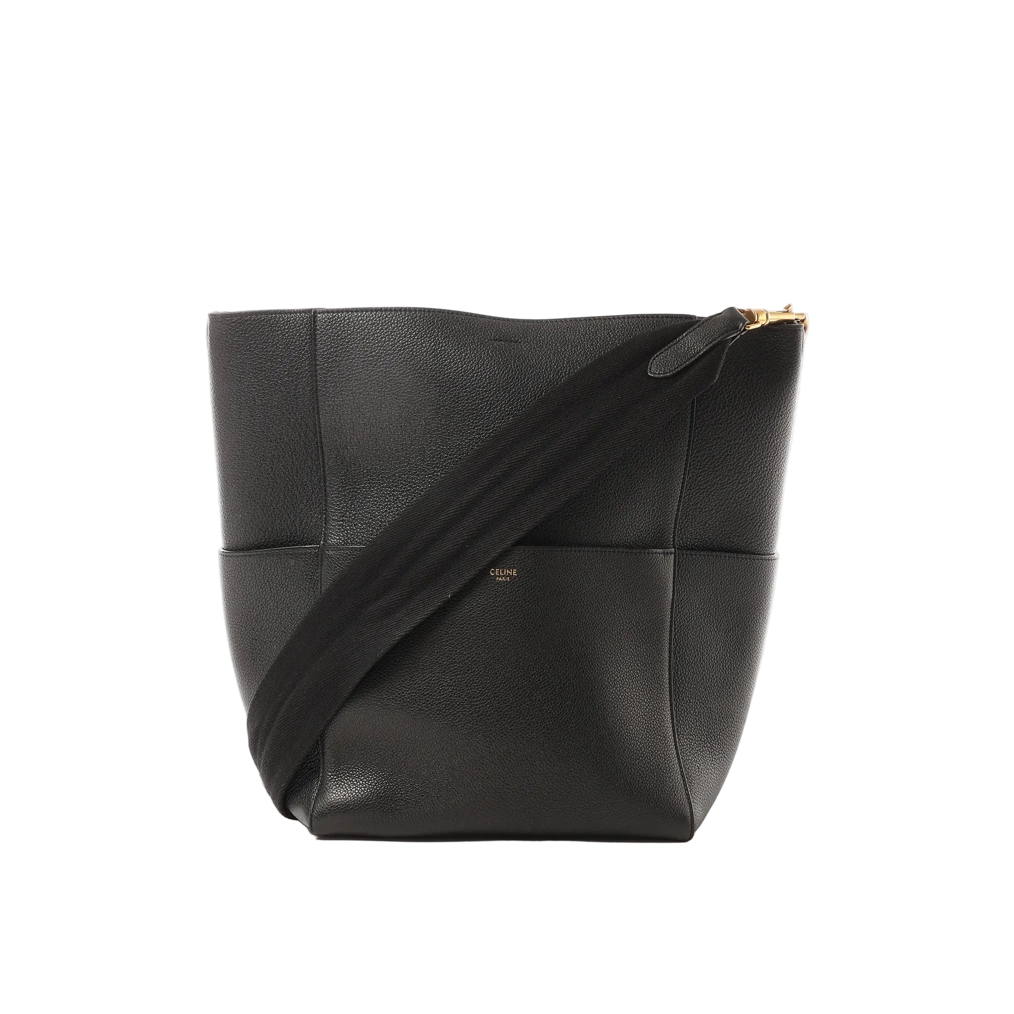 Black Celine Seau Sangle leather bucket shoulder bag with wide black web strap and small gold Celine Paris logo, shown on a white background.