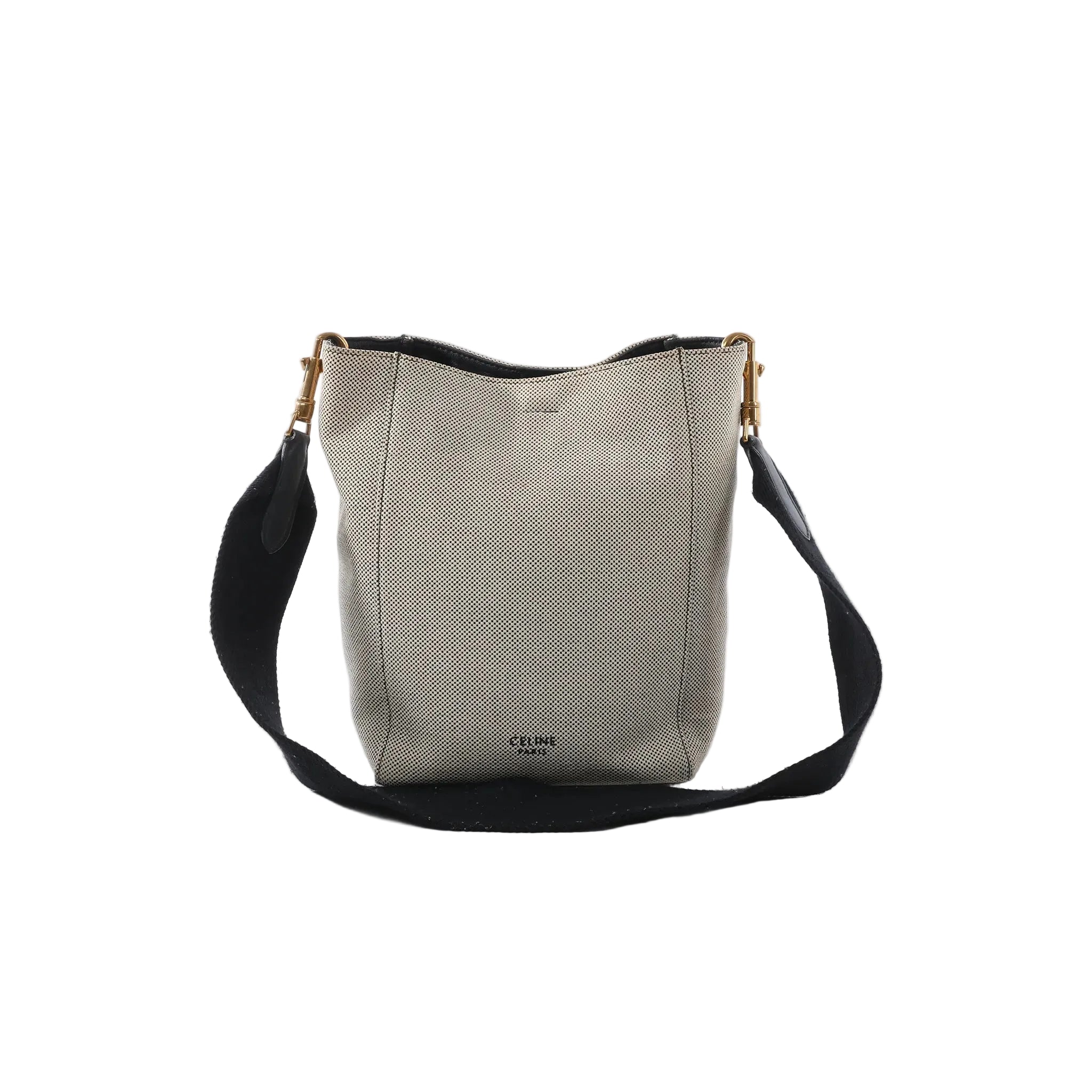 Celine Seau Sangle small beige canvas bucket bag with navy shoulder strap, gold-tone hardware, and Celine logo on white background.
