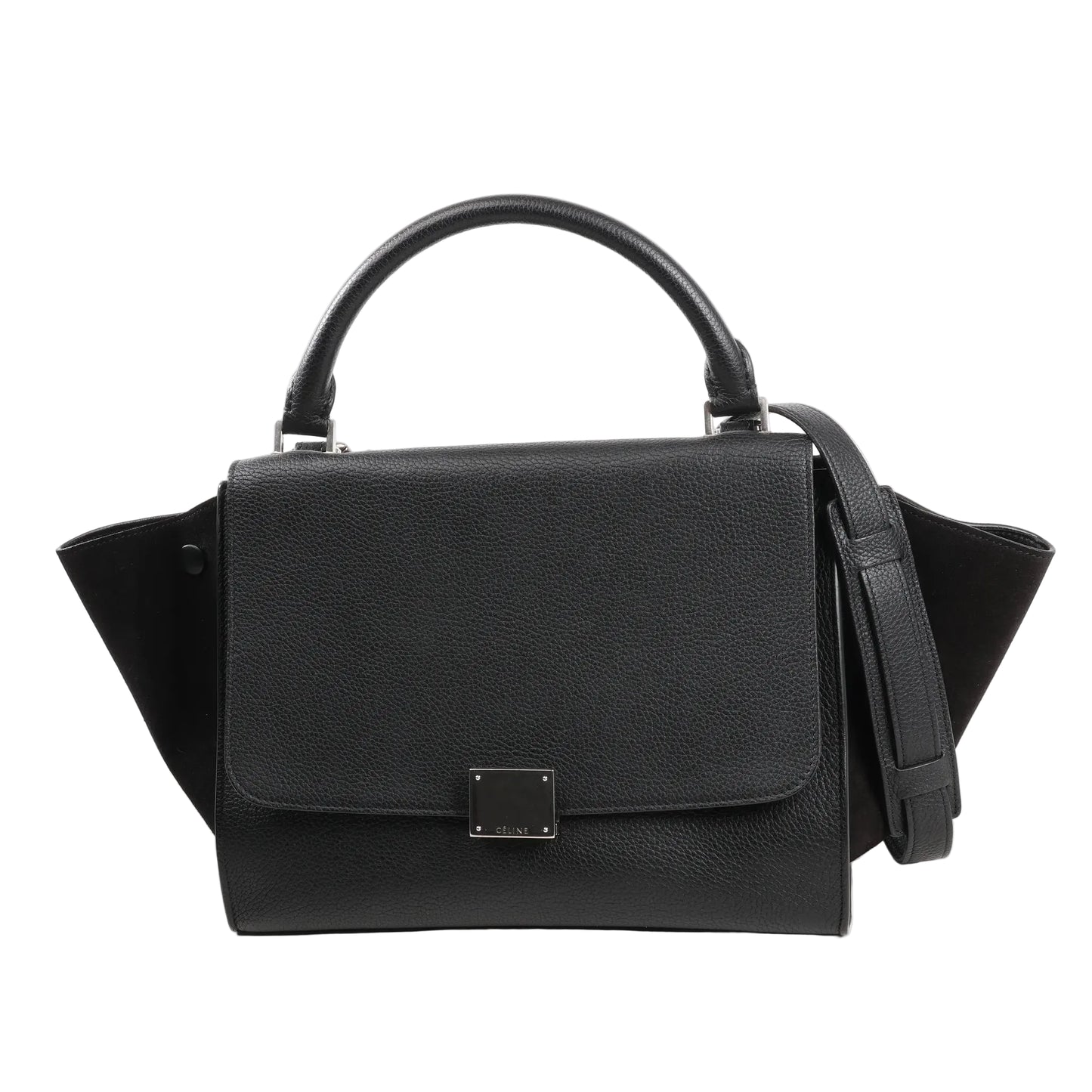 CELINE Trapeze 2Way handbag in black grained leather with suede side wings, featuring a structured flap front, top handle, detachable shoulder strap, and silver-tone hardware.