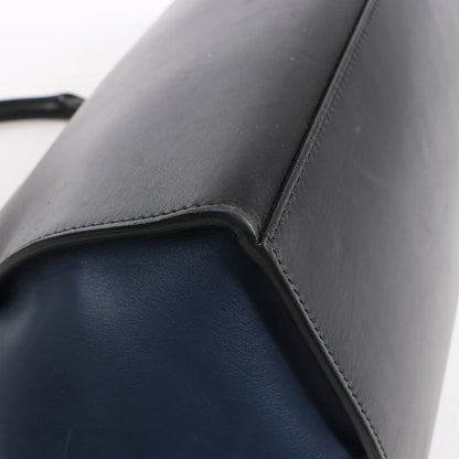 Sac à main double sens en cuir et daim trapèze CELINE en noir, bleu marine et taupe