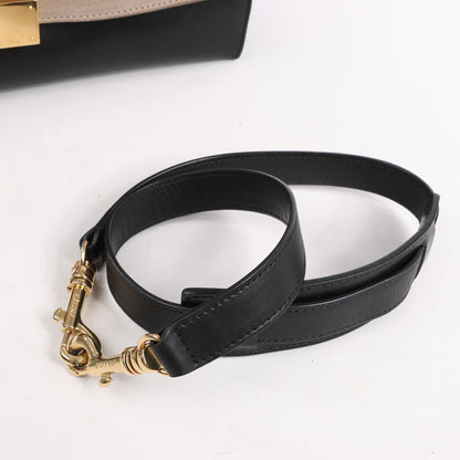 Sac à main double sens en cuir et daim trapèze CELINE en noir, bleu marine et taupe