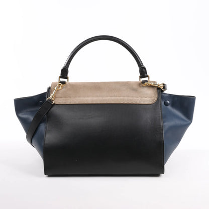 Sac à main double sens en cuir et daim trapèze CELINE en noir, bleu marine et taupe
