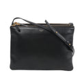 Front view of the Celine Trio Large Leather Crossbody Bag in black, showcasing smooth black calfskin leather, gold-tone zippers, an adjustable leather shoulder strap, and subtle Celine Paris branding, all set against a white background.
