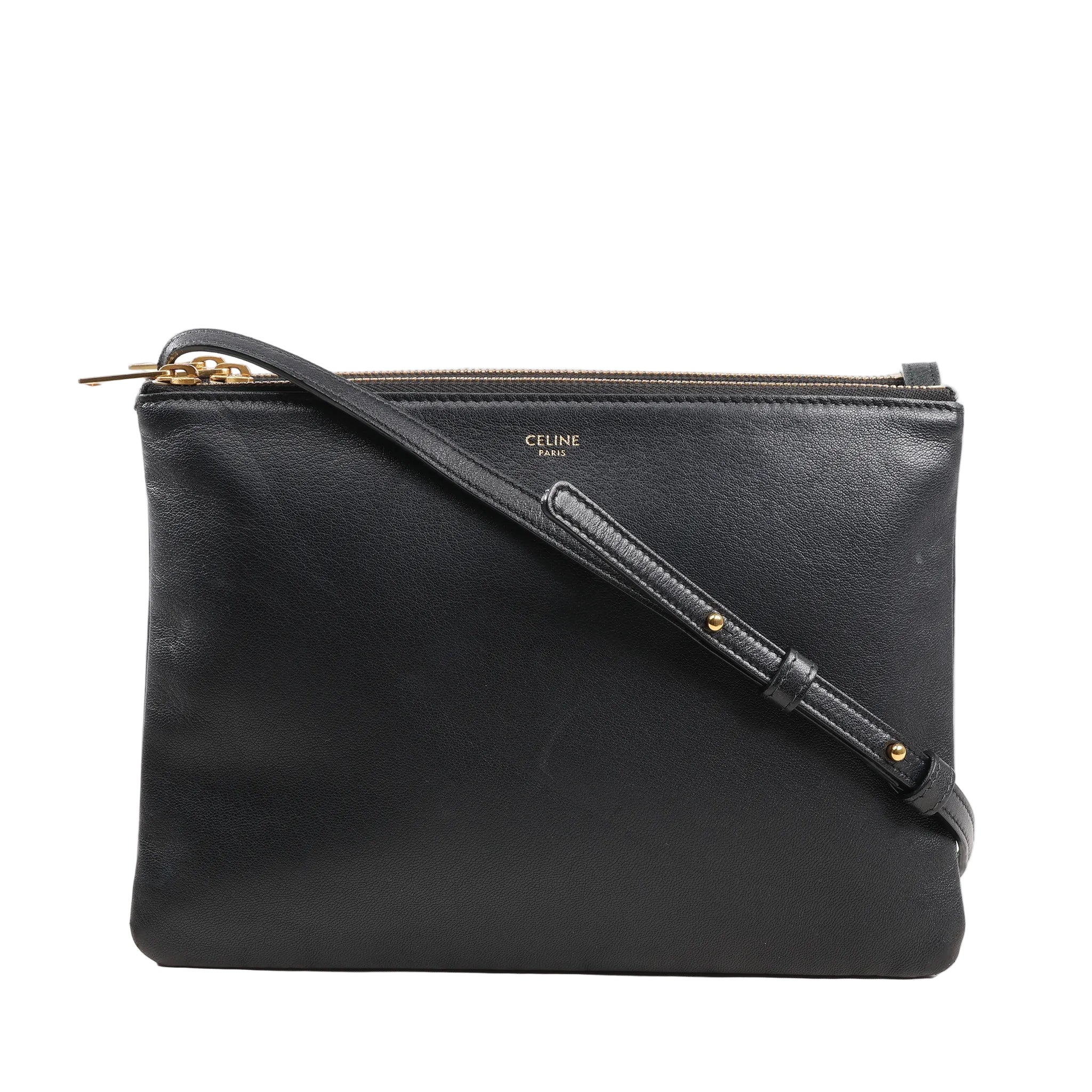 Celine Trio Large crossbody bag in black leather with gold-tone zippers, adjustable shoulder strap, and three detachable compartments.