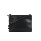 Black Celine Trio Large leather crossbody bag with zip-top closure, slim strap, and small gold logo stamp on a white background