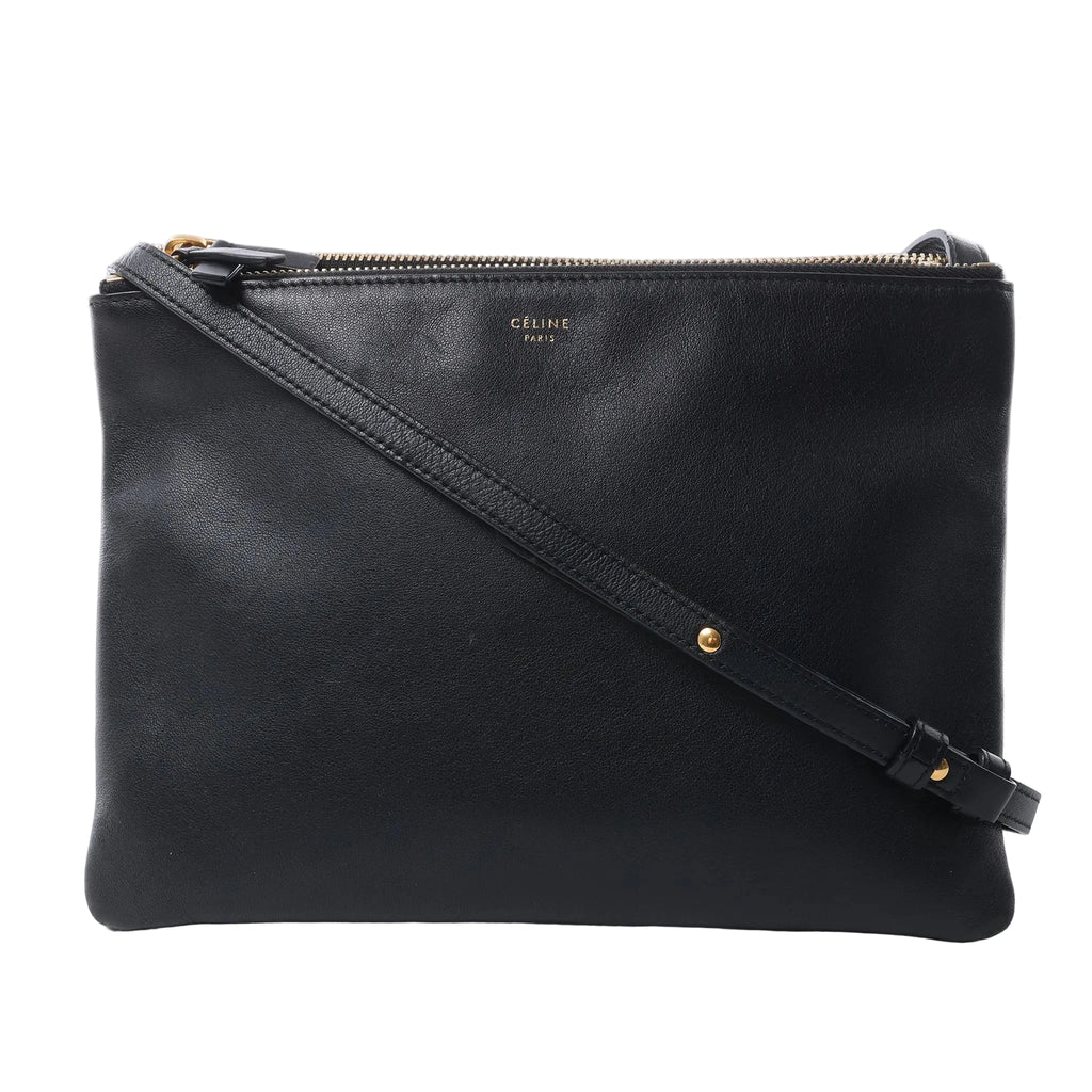 Celine Trio Large black leather crossbody bag with a rectangular shape, top zip closure, gold-tone logo and adjustable shoulder strap.